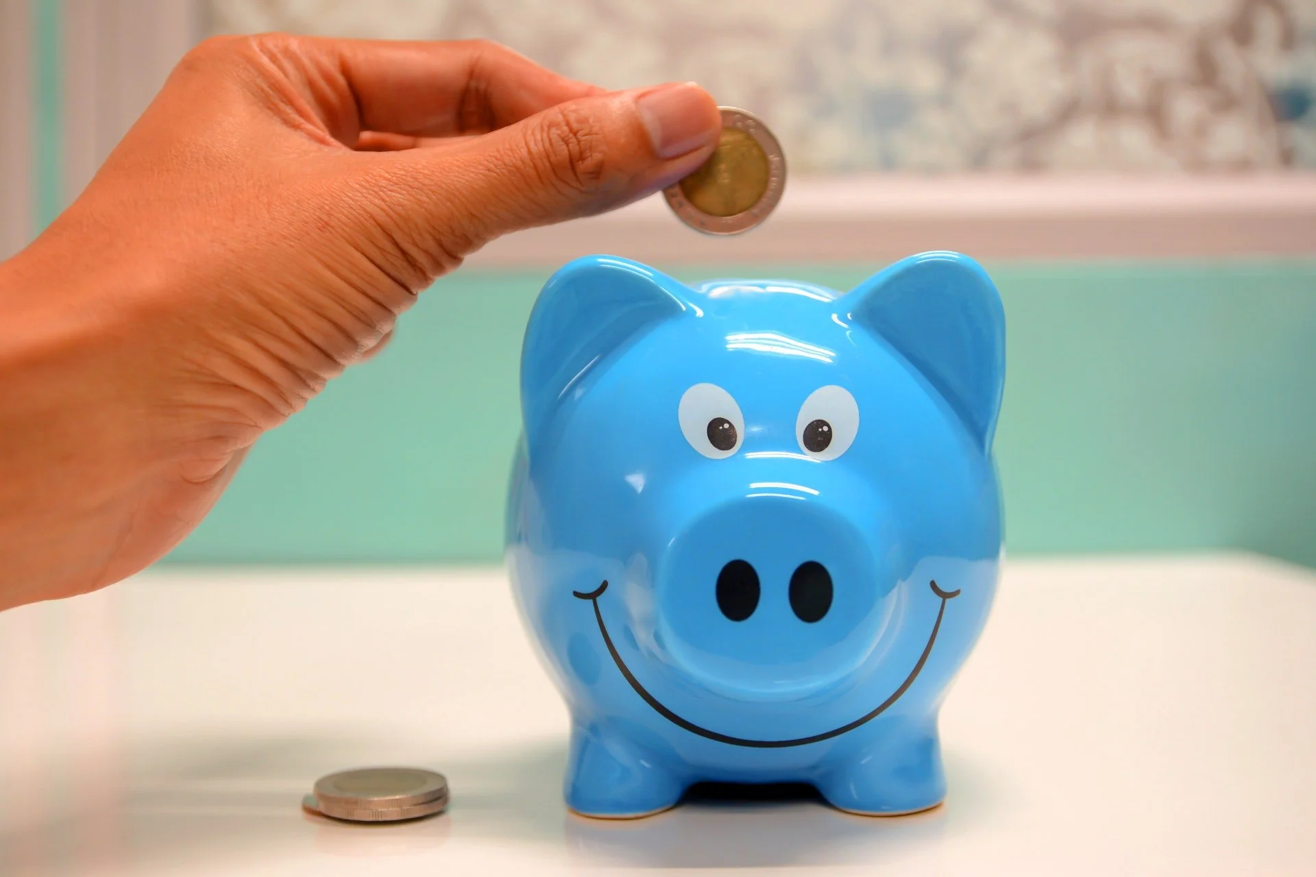 Saving pennies in a piggy bank